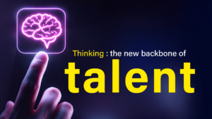 A hand pointing upward toward a glowing neon brain icon, with the text 'Thinking: the new backbone of talent' on a dark blue background. AI innovation self-efficacy